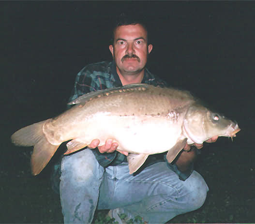 Karpfen, 65cm, 5.5kg, gefangen von Ralf Parthaune im August 2002